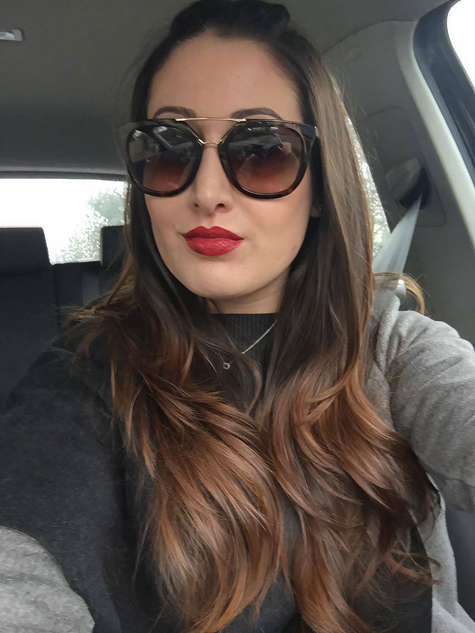 Actual patient wearing Babor Age ID Mattifying makeup and Prada sunglasses